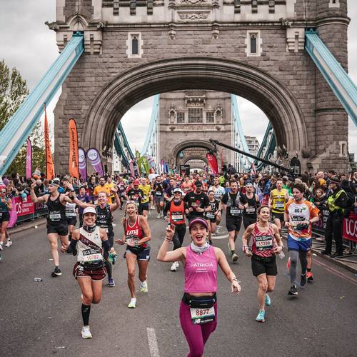 Runners crossing Tower Bridge in London
